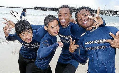 Participants in the migrant program have fun at the beach. Participants in the migrant program have fun at the beach.